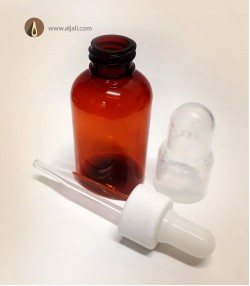 قنينة مع قطارة قنينة مع قطارة